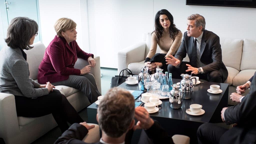 Merkel a menekültekről csevegett George Clooney-val